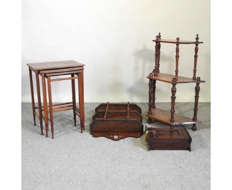 A Victorian fret carved mahogany wall shelf, with a mirrored back, together with an Edwardian nest of three mahogany occasion