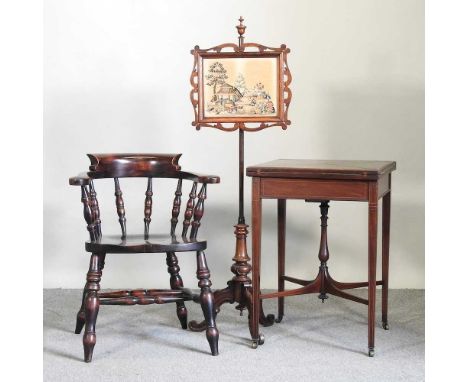 An Edwardian mahogany envelope card table, 54cm, together with a pole screen and a reproduction open armchair (3)