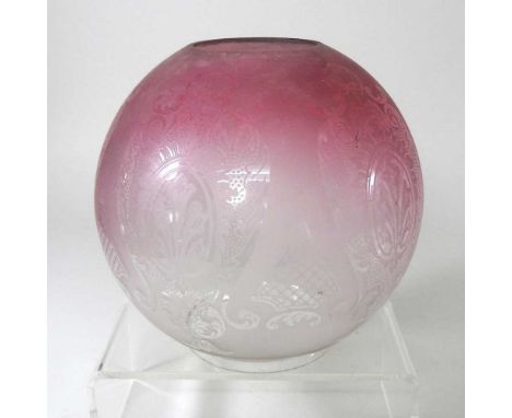 A late 19th century brass oil lamp, with a painted pink opaline font and etched glass shade, 57cm highDirty. Font appears com