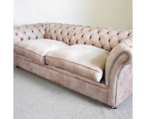 A modern hide upholstered chesterfield sofa, with a button back, by Chesterfield Couture248w x 96d x 75h cm