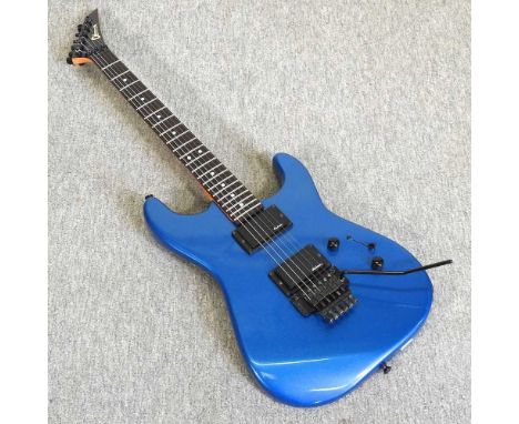 A vintage 1987 Charvel model 3A blue electric guitar, made in Japan, with soft case