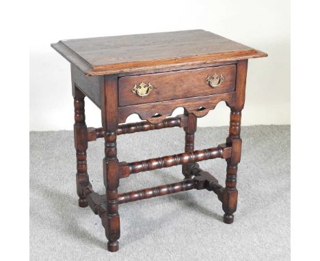An 18th century style oak lowboy, on bobbin turned legs69w x 40d x 71h cm