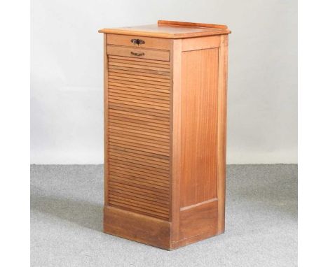 An early 20th century light oak filing cabinet, with a tambour front48w x 41d x 63h cm