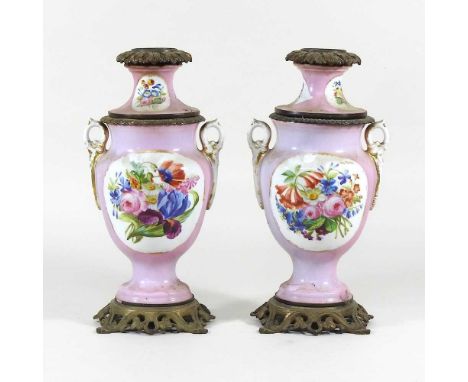 A pair of oil lamp bases (2)Very dirty but they look to be intact. Some wear to the decoration and gilt. Each has a thread in