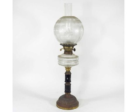 A Victorian brass and pottery oil lamp, with a clear glass font and etched clear glass shade, 60cm high