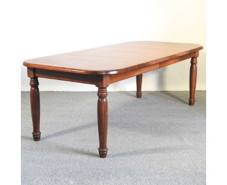 A modern oak dining table, with two additional leaves, on turned legs226w x 101d x 75h cm overall (146w closed)Ovreall clean 