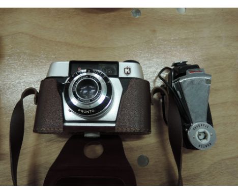 A vintage German Regulate camera and light meter