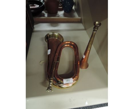 A brass bugle and hunting horn