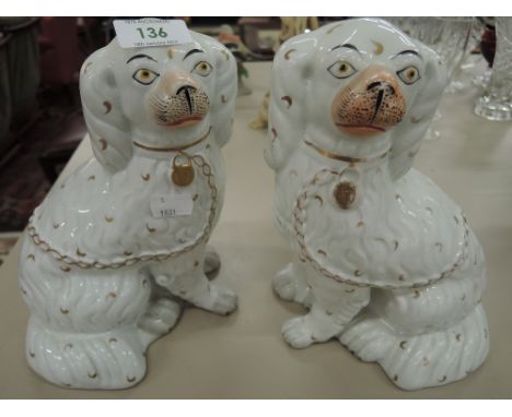 A pair of ceramic mantle dogs
