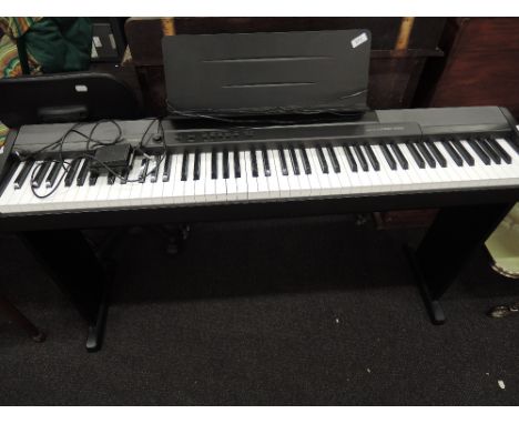 A Casio CDP100 digital piano