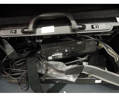 A Sharp video camera VL-C650 and accessories in case