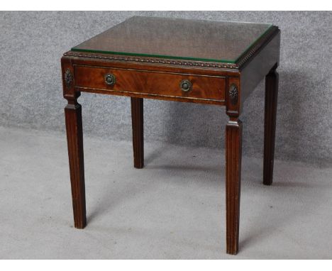 A Georgian style mahogany lamp table fitted with frieze drawer on square tapering supports. H.61 W.56 D.56cm 