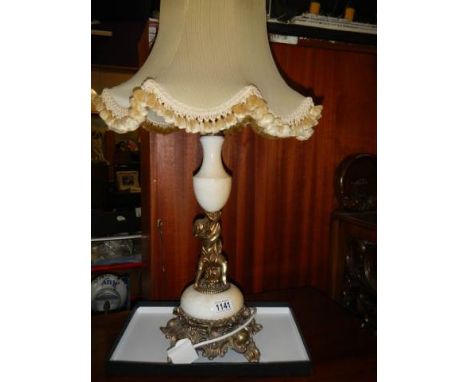 A circa 1950's heavy marble table lamp with gilded cherub figure. COLLECT ONLY.