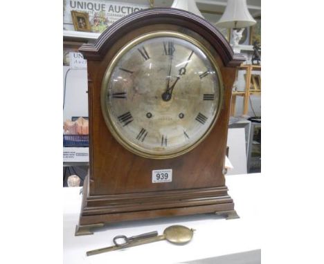 A late Victorian mahogany bracket clock, in working order.Wear to silvered dial, mahogany faded/patinated with age, H38cm, W3