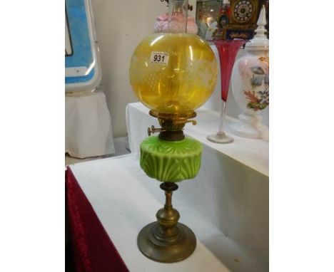 An Early 20th century oil lamp with glass font and shade. COLLECT ONLY.