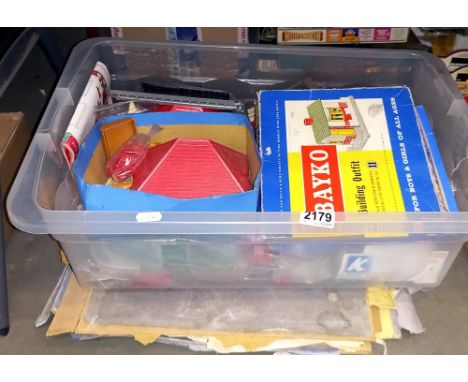 A large box of Bayko building parts