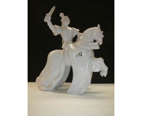 A ceramic figure of a Samaroi soldier on a horse.