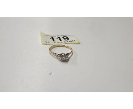 An 18ct gold and diamond ring, size R, 2.1 grams.