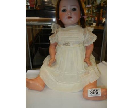 An Armand Marseille bisque headed doll, model No 985 A.6.M, 48 cm / 19", in good condition.