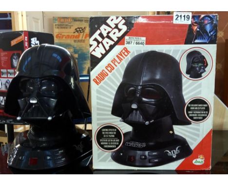 A boxed Star Wars 'Darth Vadar' radio and CD player.