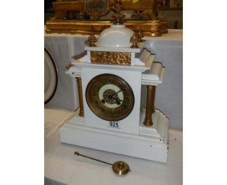 An Edwardian slate mantel clock, in working order.
