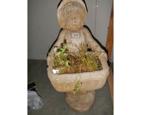 A garden statue of a girl the trough, COLLECT ONLY.