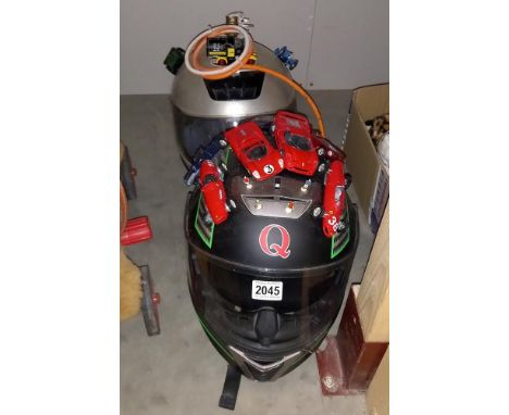 2 motorcycle helmets with diecast  model car enhancements etc