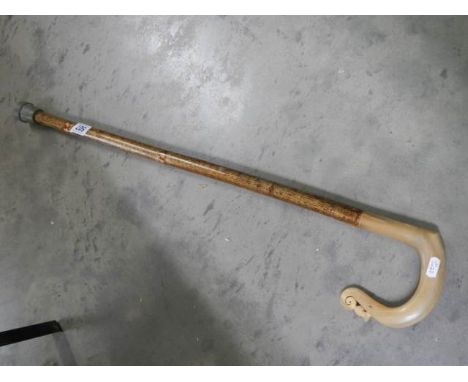 A Scottish style walking stick with bone handle.