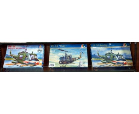 3 sealed boxed Italleri model kits, 2 gunship helicopters, both UH-1C , UUIB 'Huey' believed to be complete