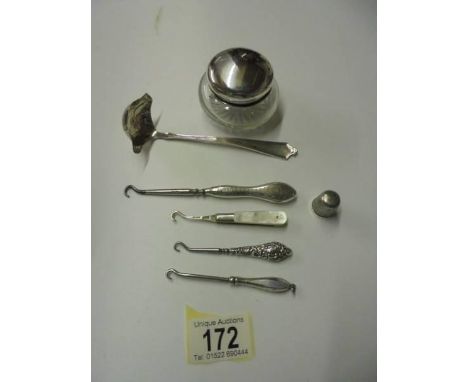 3 silver handled button hooks, a silver &amp; mother of pearl button hook, a silver sauce ladle, silver thimble and silver to