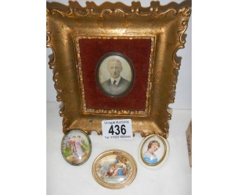 A gilt framed miniature portrait and three other miniatures.