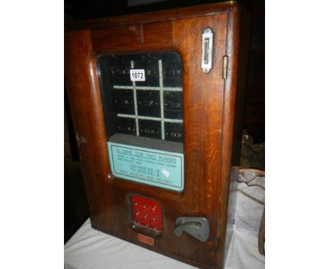 An old fairground noughts & crosses penny in the slot movement machine, COLLECT ONLY45cm x 18cm x 63cm