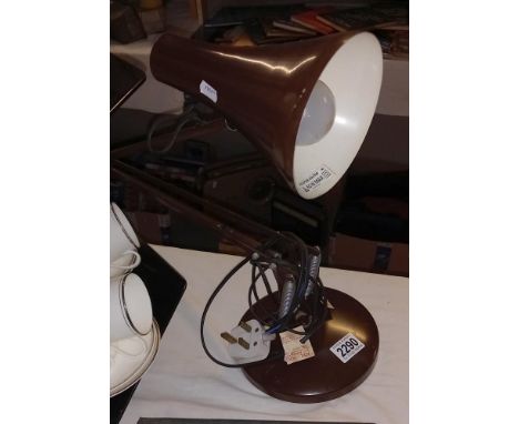 An angle poise lamp
