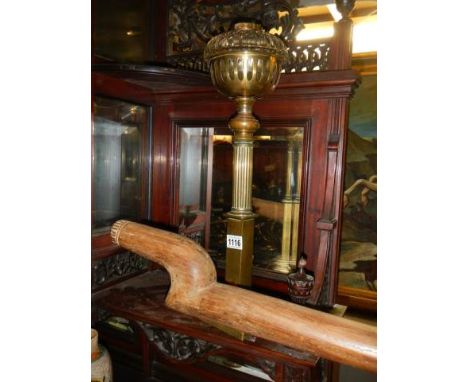 A Victorian oil lamp with drop in font, COLLECT ONLY.