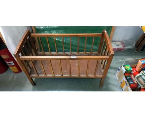 A vintage wooden dolls cot  COLLECT ONLY