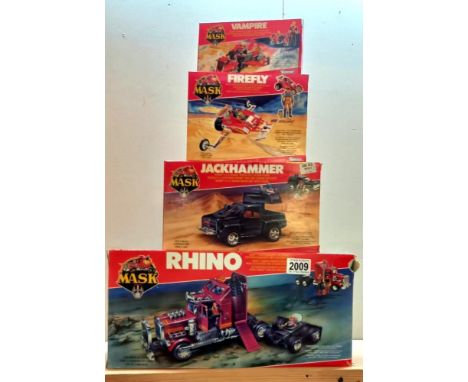 4 vintage boxed Kenner Mask including Rhino, Jadehammer, Firefly and Vampire