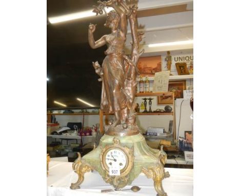 A good French mantel clock surmounted spelter female figure, in working order COLLECT ONLY.