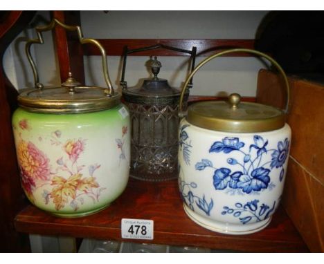 Three good biscuit barrels - two ceramic and one glass.