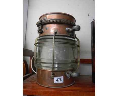 A good quality early 20th century copper ships lamp. Converted to electric