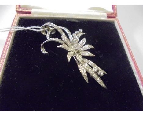 A superb quality 18ct white gold and diamond set brooch as a flower spray. (11.8gms)Full hallmark & model No.102275  5cm x 3c