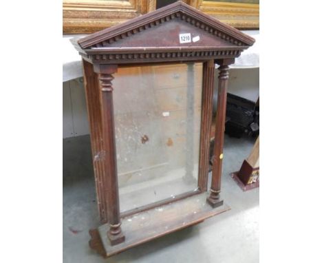 A mahogany framed mirror with shelf, COLLECT ONLY.