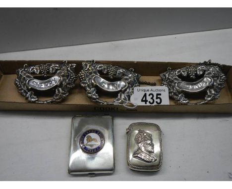 Three EPNS decanter lables and two EPNS vesta cases.