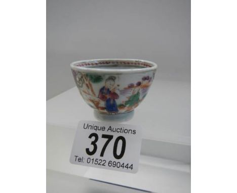 An 18th century Chinese ceramic wine cup.