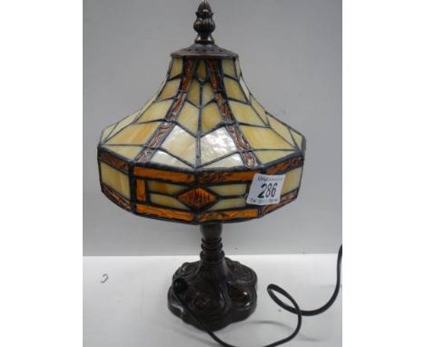 A table lamp with Tiffany style shade, 31 cm tall.