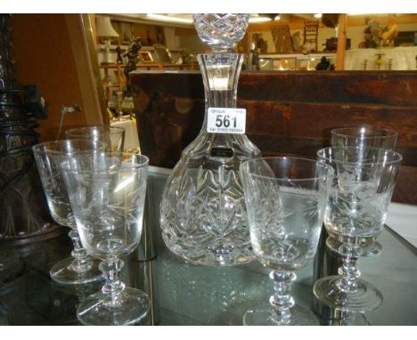 A mid 20th century cut glass decanter and six glasses.