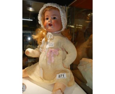 An Armand Marseille bisque headed doll, model No. 992, A.9.M. 50 cm / 24 ", in good condition.