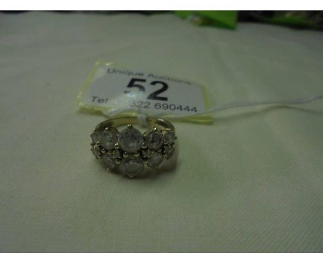 A 9ct gold ring set clear stones, size M, 3.9 grams.