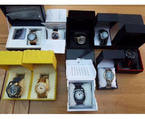 Nine cased designer watches - a job lot to include Ferrari, 2x Invicta, Maserati, Skagen, Hard Rock Café, Diesel and others, 