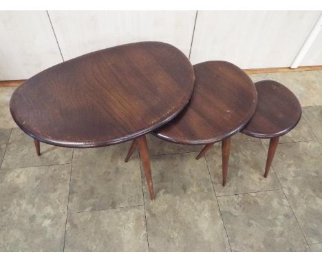 Ercol - A nest of three Pebble occasional tables, largest approximately 40 cm x 66 cm x 46 cm. [3]

Condition Report: Large t