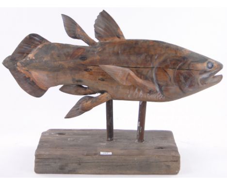 Clive Fredriksson,carved and painted wood sculpture, Coelocanthe, length 30".